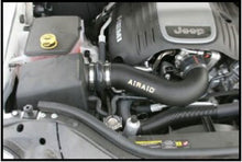 Load image into Gallery viewer, Airaid 05-10 Jeep Grand Cherokee 5.7L Hemi Airaid Jr Intake Kit - Dry / Red Media - DTX Performance